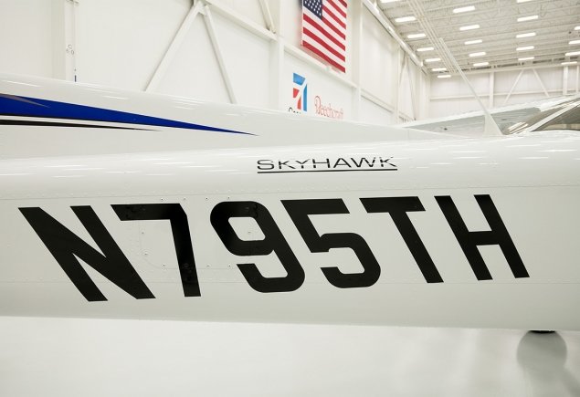 plane side with number and type on it