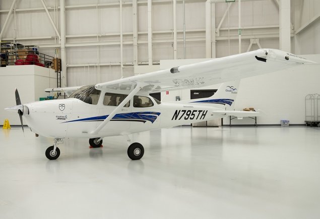 white and blue plane 